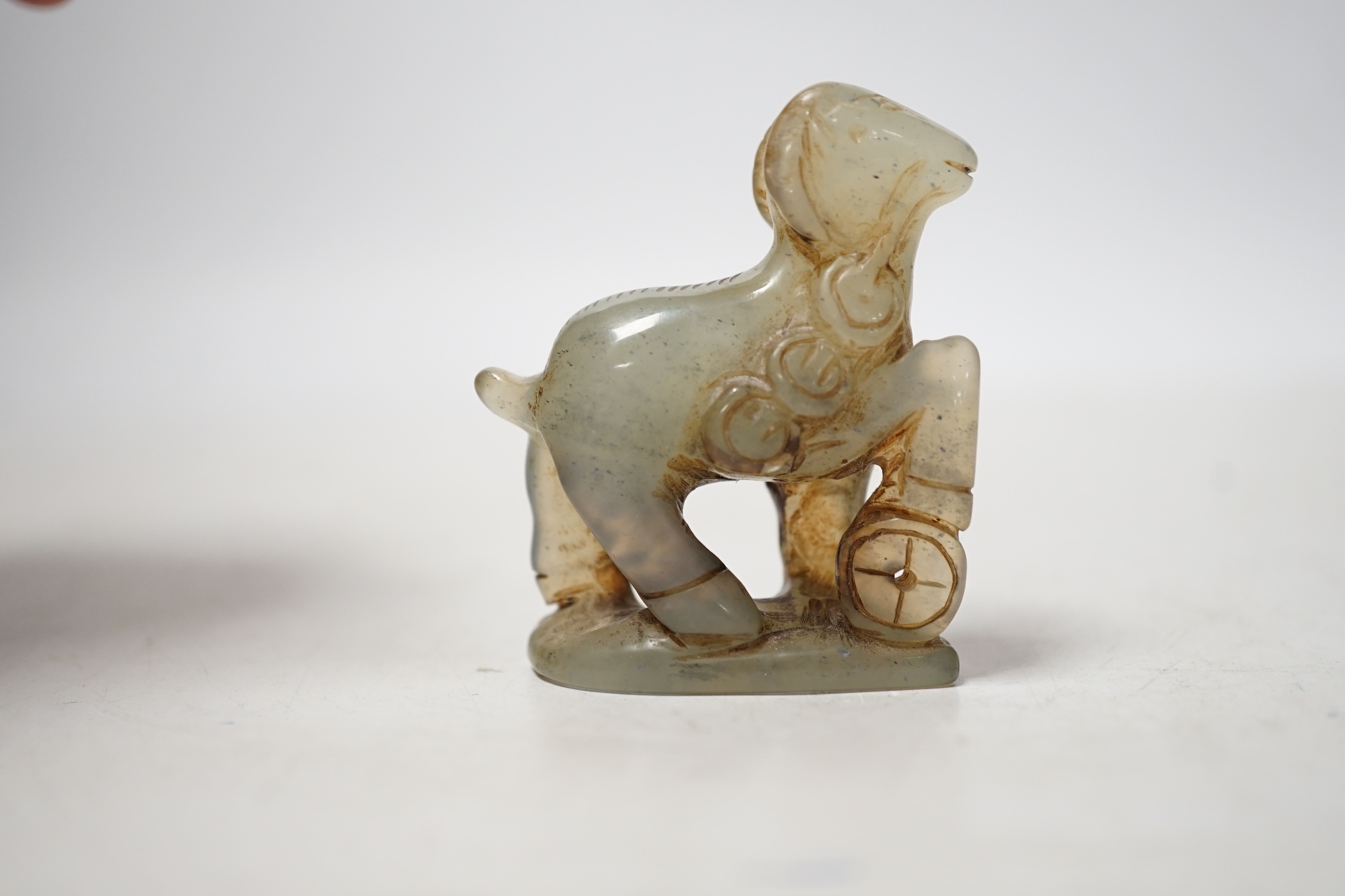 A carved bowenite jade in the form of a ram, 5.5cm high